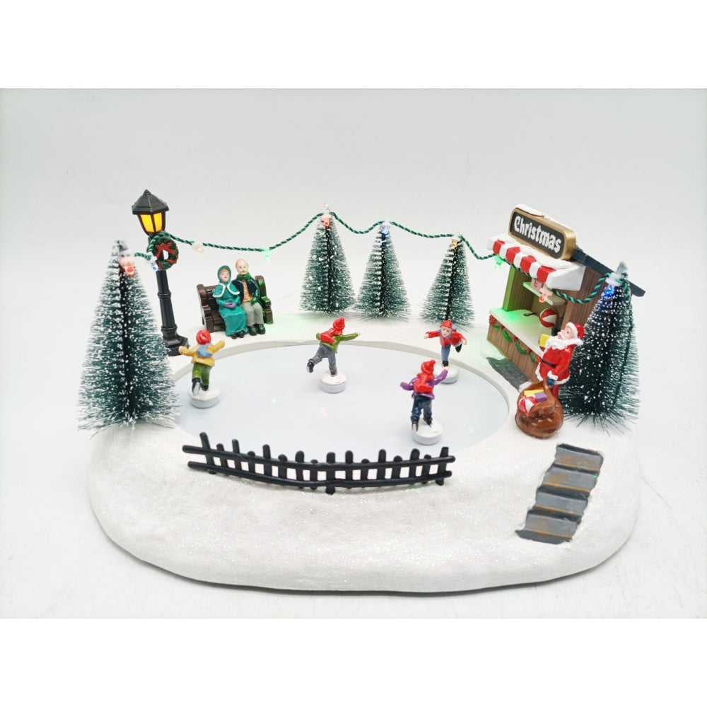 Jingles LED Winter Ice Skating Scene - 29cm